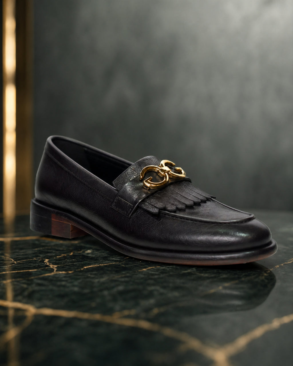 D. GlidedGentry black leather fringe loafers double gold emblem formal Pakistan